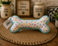 “Let’s Pawty” Sprinkle Bone Plush Dog Toy